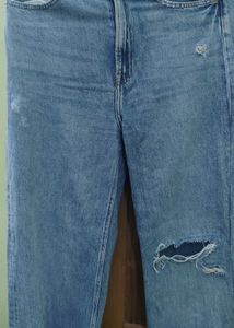 Ripped Blue Denim Jeans