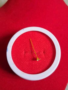 Gold Flower Nose Pin as earpressing