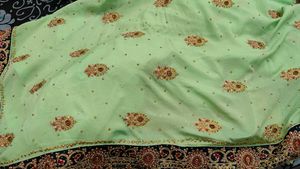 heavy party wear saree Light Green Embellished