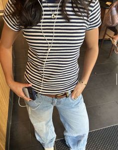 Striped baby tee with Red Star Graphic