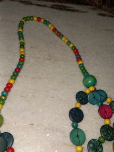 button beaded long necklace