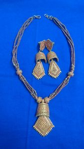 Necklace with a dull gold finish