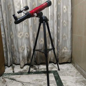 Red Telescope with Tripod