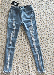 Ripped Light Wash Skinny Jeans