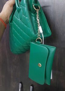 Quilted Green Handbag with a extra sling and pouch