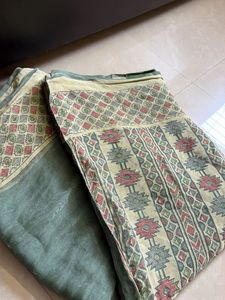 Elegant Green Saree with Geometric Border