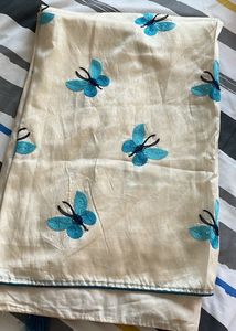 Cream Saree with Blue Butterfly Embroidery
