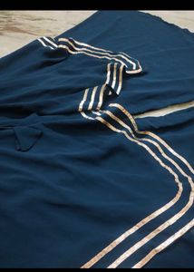 Elegant Teal Kurta Set with Decorative Trim