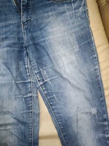 Distressed Denim Jeans