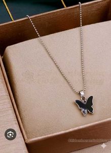 Butterfly Pendant Necklace (it's in unopened packa