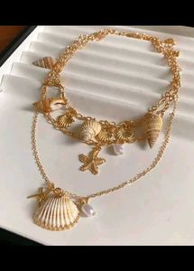 Boho Seashell Layered Necklace and rings from sava