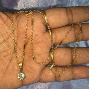 Elegant Gold Necklace with Crystal Pendant