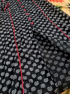 Black Printed Kurti with Red Polka-Dot Pants –