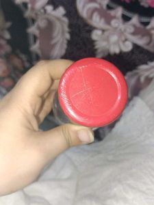 Glass Bottle with Red Lid