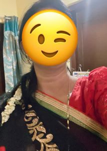 Elegant Black Saree with Red Embellishments