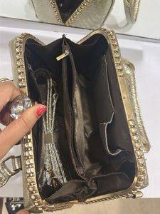 Elegant Gold Embossed Handbag