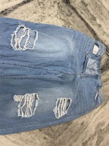 Ripped Wide-Leg Denim Jeans