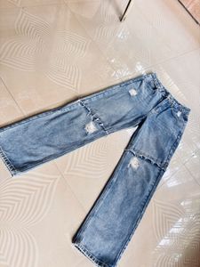Ripped Light Wash Denim Jeans