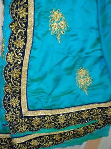 Elegant sea green Embroidered Saree