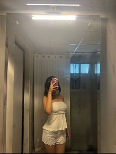 Two peplum  tops in black and white