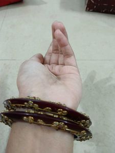 2  Maroon Bangles with Golden Embellishment