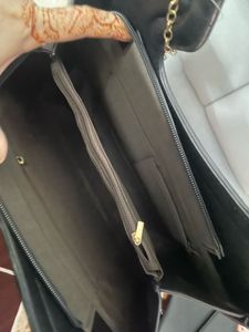 Stylish Black Handbag with Heart Handle