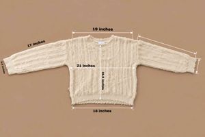 IVORY DISTRESSED TEXTURED KNIT SWEATER
