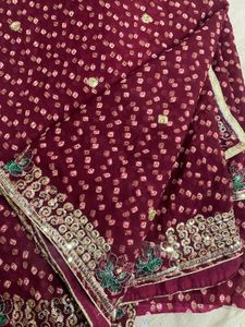 Maroon Bandhani Saree with Gold Border