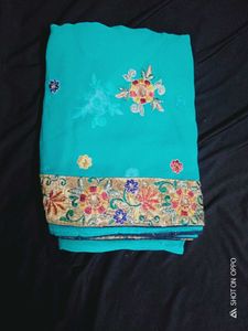 Turquoise Embroidered Saree