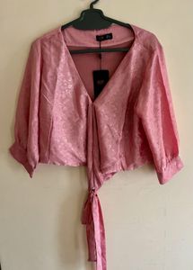 Tie on the romance in satin rose.
