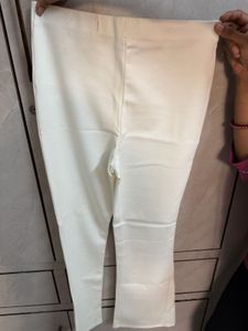 women white slim fit mid rise trousers