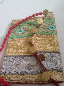 Embroidered Clutch with Coin Detail