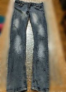 Distressed Blue Denim Jeans
