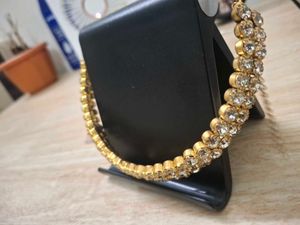 Stunning Gold Bangle with Crystals
