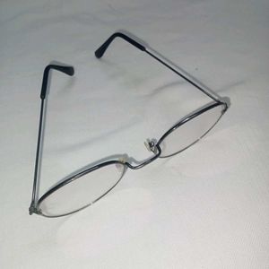 minimal round glasses.