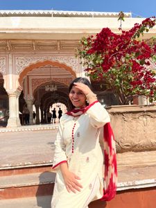 Elegant Cream Kurta with Red Accents