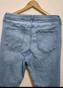 Light Wash Ripped Button Fly Jeans