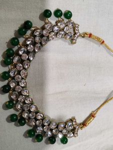 Elegant Kundan Necklace with Green Beads