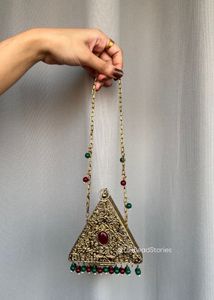 Exquisite Geometric Clutch with Gemstone