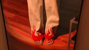 It's a blue wide leg jeans with hand paint