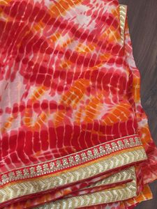 Vibrant Tie-Dye Saree with Golden Border