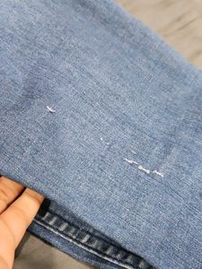 Distressed Blue Denim Jeans