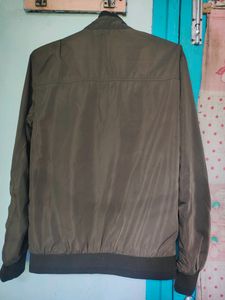 A Winter Jacket With Dual Colours. You can Use It Both Ways - Tortoise Olive And Ocean Blue.