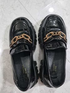 Chic Black Patent Loafers with Gold Chain Accent