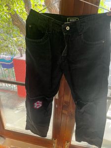 Distressed Black Jeans with Patches