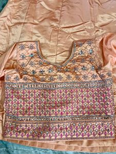 Peachy Embroidered Lehenga Choli Set