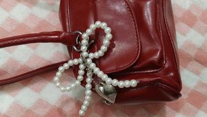 Red Handbag with Pearl Detail