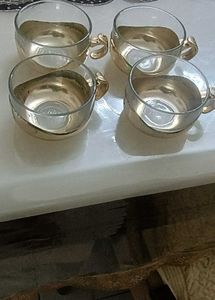 Four golden Glass cups