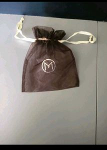 malabar gold n diamonds drawstring potli with logo