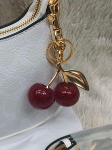 coach White Handbag Set with Cherry Charm 🤍
